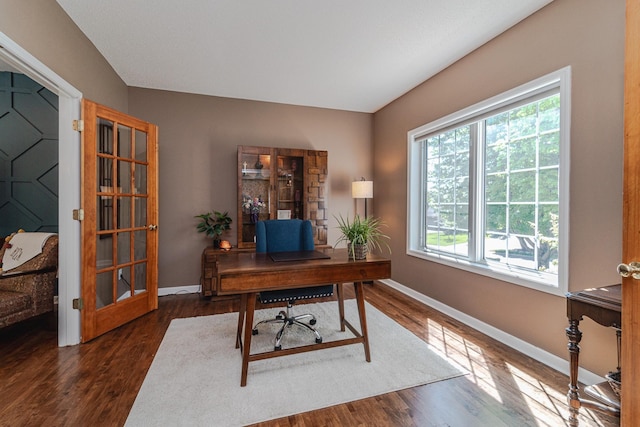 office with baseboards and wood finished floors
