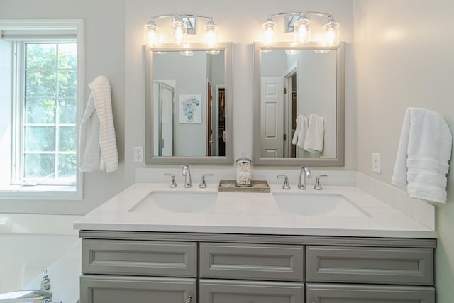 full bath featuring double vanity