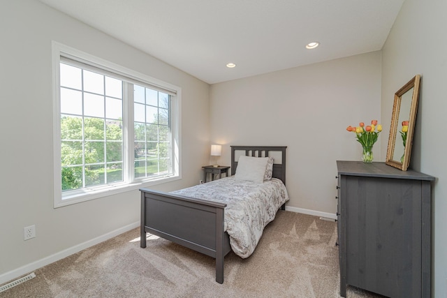carpeted bedroom with baseboards and recessed lighting