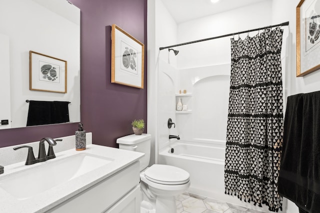 bathroom featuring toilet, vanity, and shower / bath combo with shower curtain