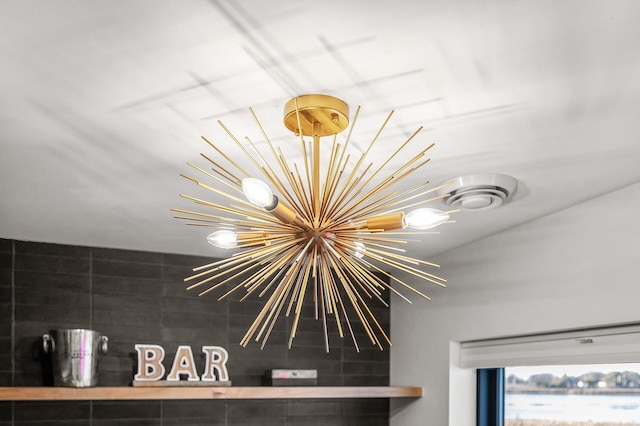 details with an inviting chandelier