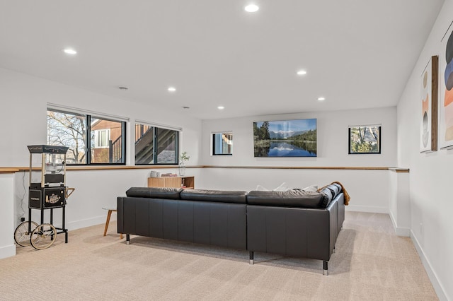 living area featuring recessed lighting, carpet flooring, and baseboards