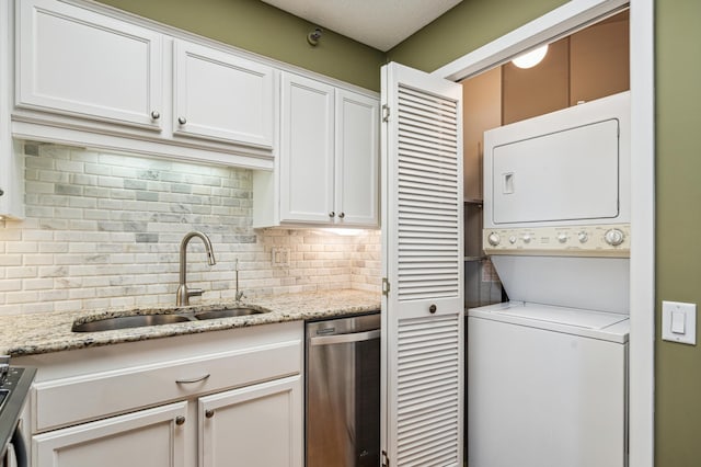 2950 Dean Pkwy Unit 2005, Minneapolis, MN 55416 - kitchen featuring dishwasher, stacked washer / drying machine, a sink, decorative backsplash, and white cabinetry