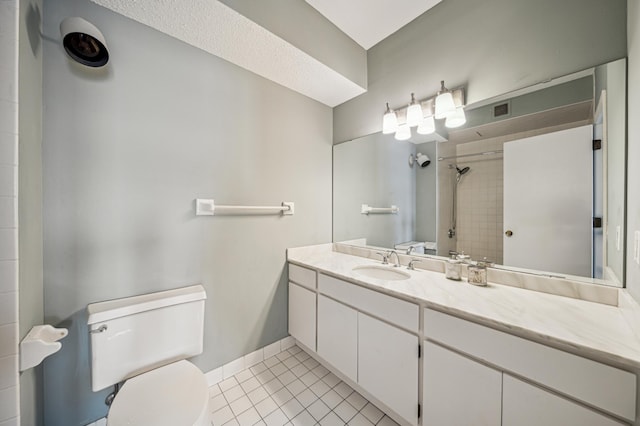 2950 Dean Pkwy Unit 2005, Minneapolis, MN 55416 - bathroom with toilet, tile patterned floors, vanity, a shower, and baseboards