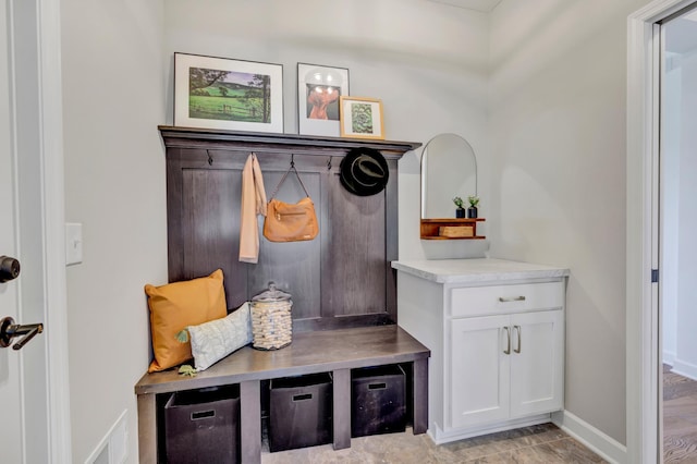 mudroom featuring baseboards and visible vents