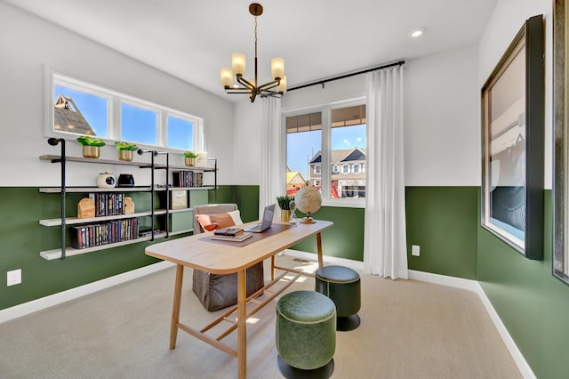 home office with an inviting chandelier, baseboards, and carpet floors