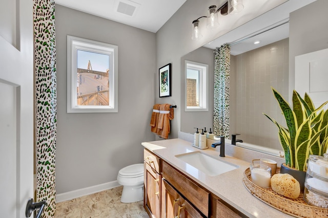 bathroom featuring vanity, curtained shower, baseboards, toilet, and visible vents