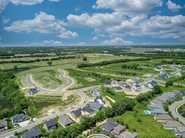 bird's eye view with a residential view and a water view