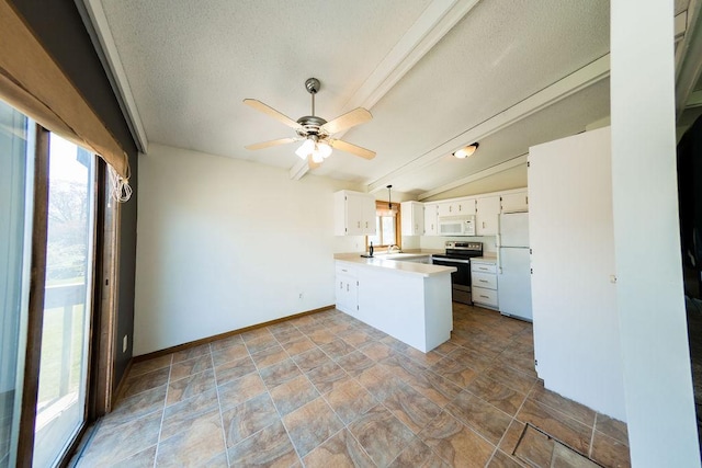 kitchen featuring a sink, a peninsula, white appliances, ceiling fan, and white cabinets