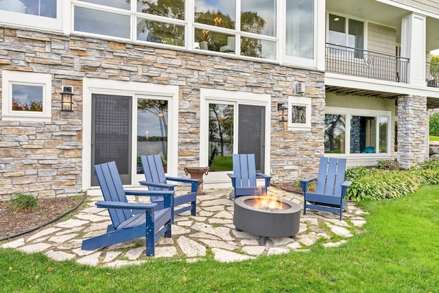 2625 Woodbridge Rd, Minnetonka Beach, MN 55391 - view of patio / terrace with a fire pit