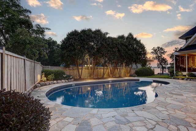 2625 Woodbridge Rd, Minnetonka Beach, MN 55391 - pool at dusk with a fenced backyard and a patio