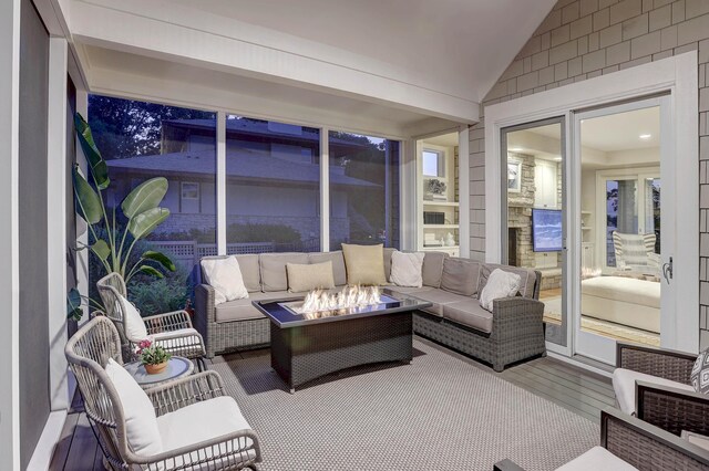 2625 Woodbridge Rd, Minnetonka Beach, MN 55391 - sunroom featuring an outdoor living space with a fire pit and vaulted ceiling