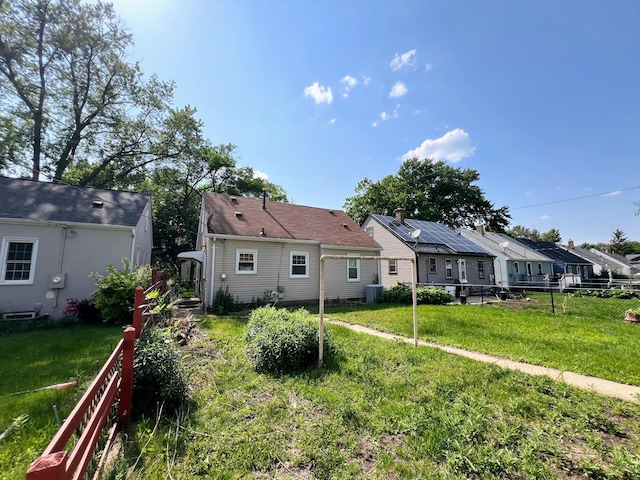 2849 Jersey Ave S, Saint Louis Park, MN 55426 - rear view of property featuring central AC unit and a residential view