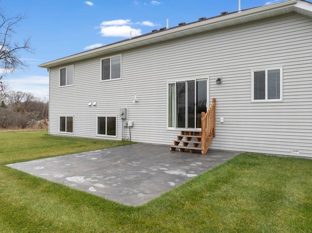 24235 143rd St NW, Zimmerman, MN 55398 - rear view of house featuring a lawn, entry steps, and a patio area