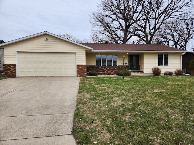 single story home featuring brick siding, a front lawn, an attached garage, and driveway