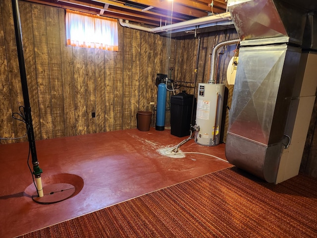 below grade area featuring water heater