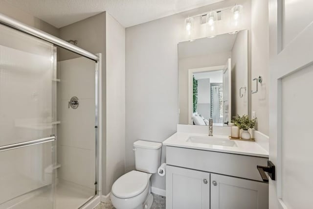 full bath featuring vanity, ensuite bathroom, a shower stall, and toilet