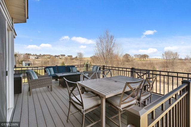 deck with outdoor dining space