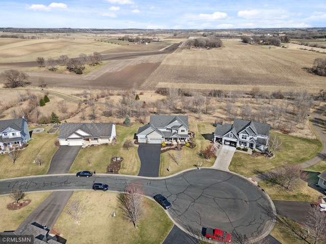 birds eye view of property featuring a rural view and a residential view