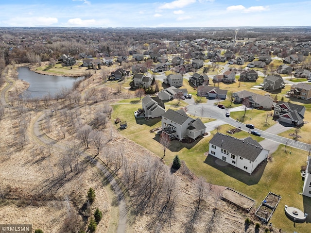 aerial view with a water view and a residential view
