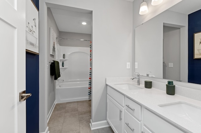 full bath with shower / bathtub combination with curtain, baseboards, tile patterned flooring, double vanity, and recessed lighting