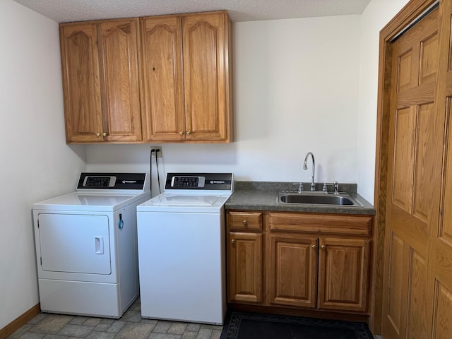 39512 92nd Ave, Onamia, MN 56359 - laundry area featuring cabinet space and independent washer and dryer