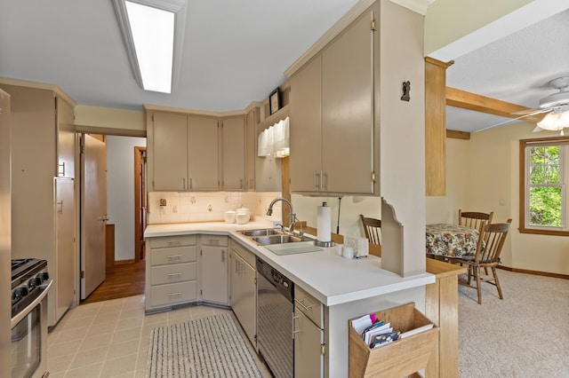 3021 Atwater St, Hopkins, MN 55305 - kitchen with dishwashing machine, stainless steel gas stove, a sink, tasteful backsplash, and light countertops