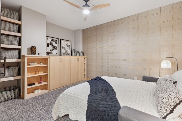 carpeted bedroom with a ceiling fan