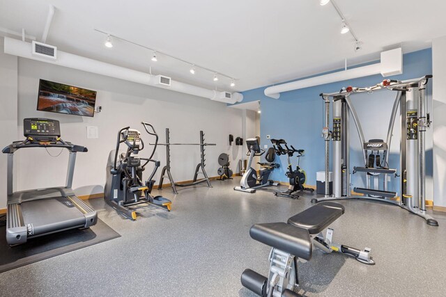 gym with rail lighting
