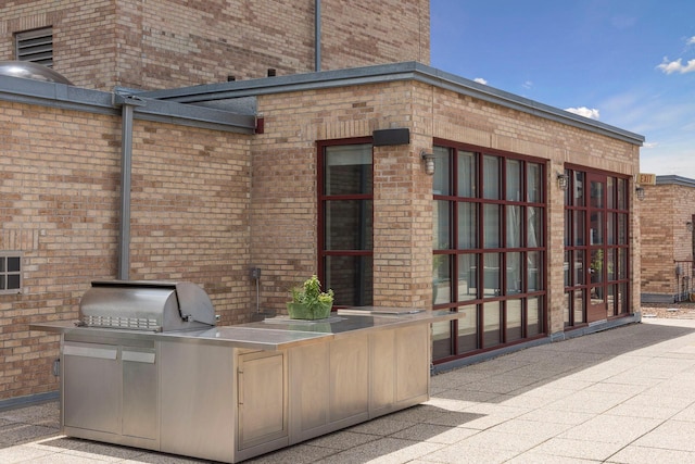 view of patio / terrace with an outdoor kitchen