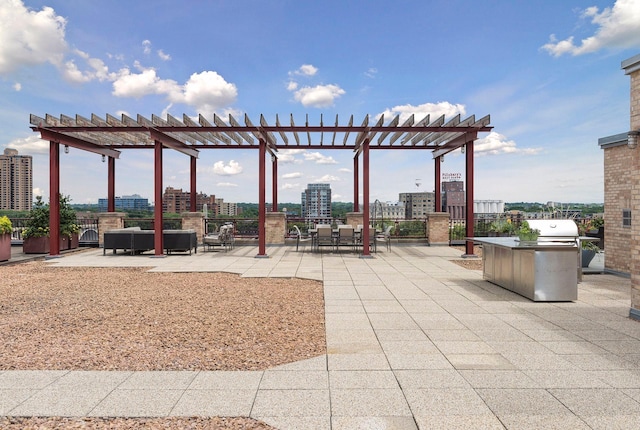view of patio / terrace with a pergola, a grill, and a view of city
