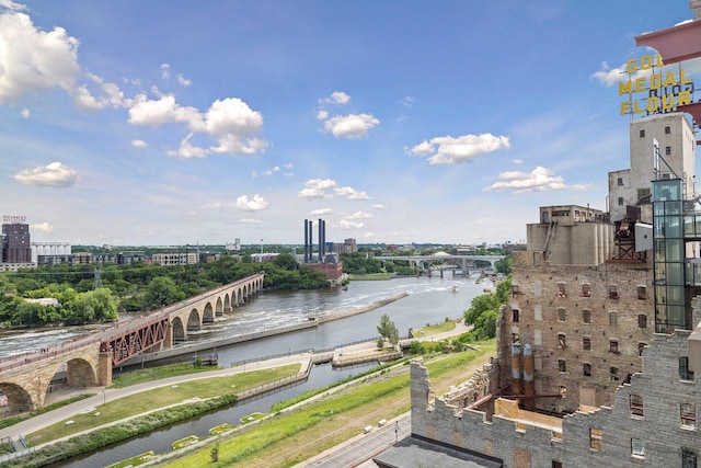 water view featuring a notable bridge and nearby urban area