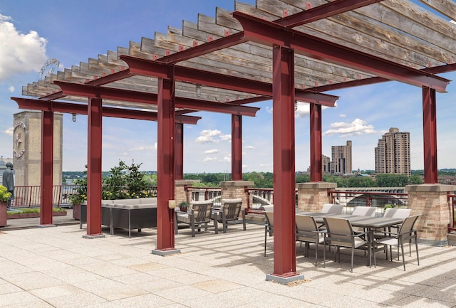 view of patio with a pergola, outdoor dining space, and an outdoor living space