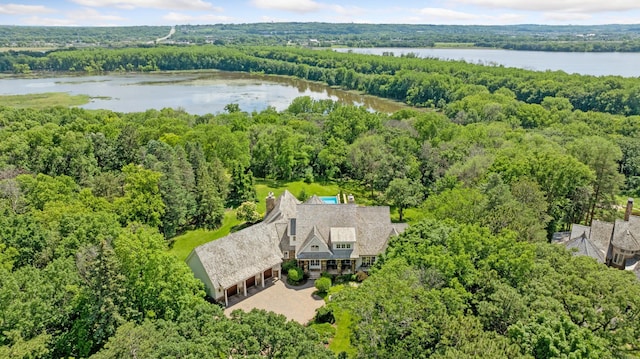 aerial view with a view of trees and a water view
