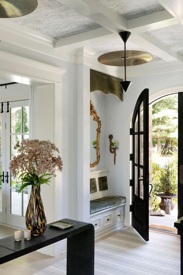 mudroom with beamed ceiling, carpet flooring, french doors, and wallpapered walls