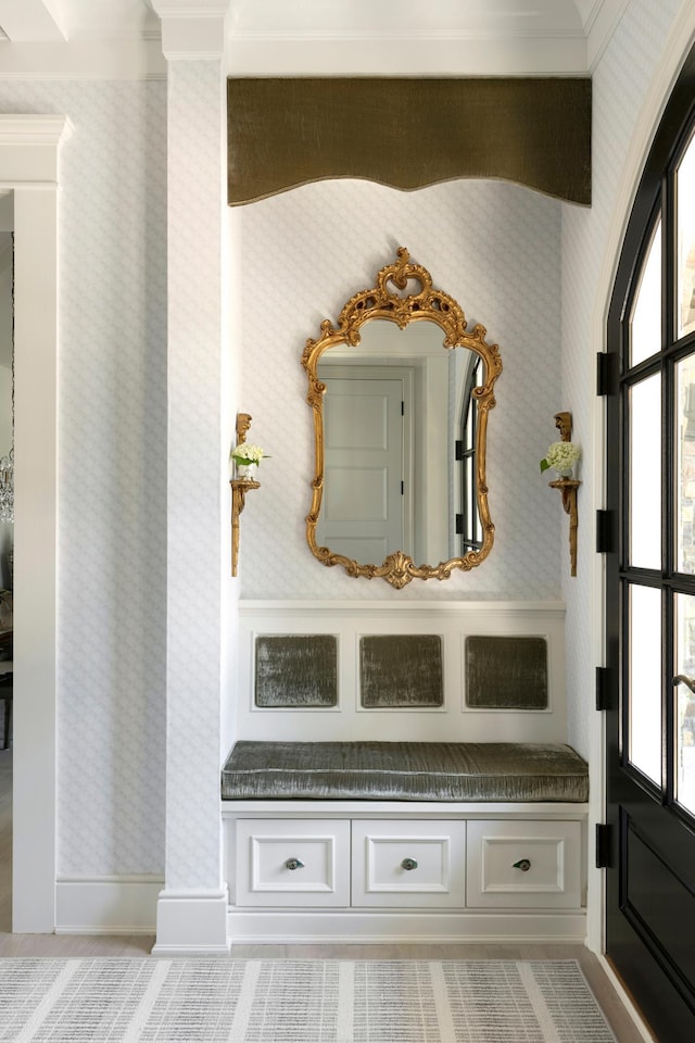 mudroom with wallpapered walls