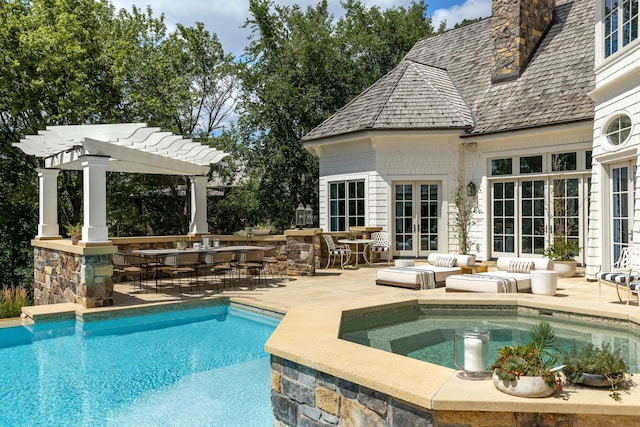 outdoor pool featuring a patio area, french doors, an in ground hot tub, and a pergola