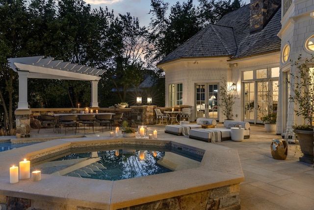 pool at dusk featuring a pergola, outdoor lounge area, a patio, an outdoor pool, and outdoor dining space