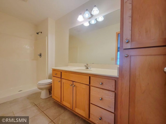 full bathroom with toilet, tile patterned floors, vanity, and walk in shower