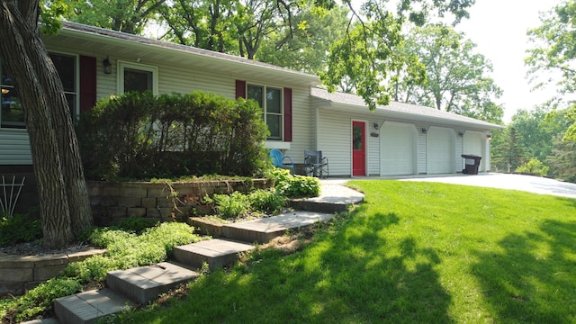 26837 Lake Ethel Rd, Girard Twp, MN 56515 - view of front facade featuring a front lawn, an attached garage, and driveway