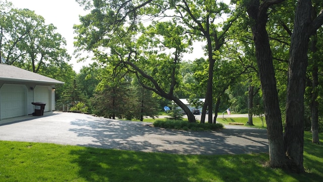 26837 Lake Ethel Rd, Girard Twp, MN 56515 - view of yard with a garage
