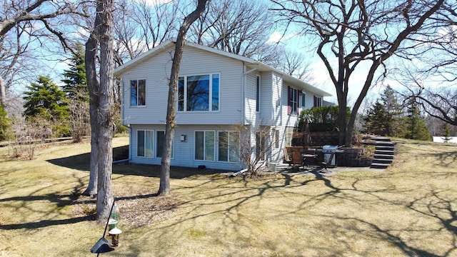 26837 Lake Ethel Rd, Girard Twp, MN 56515 - view of home's exterior with a patio and a yard