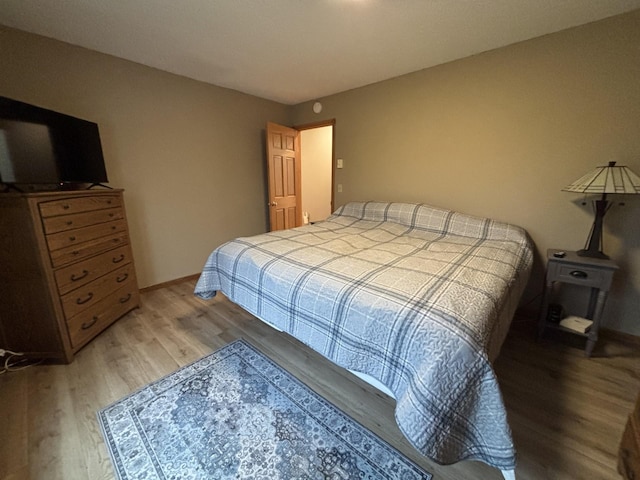 26837 Lake Ethel Rd, Girard Twp, MN 56515 - bedroom featuring light wood-style floors and baseboards