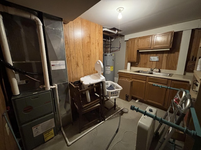 26837 Lake Ethel Rd, Girard Twp, MN 56515 - kitchen featuring water heater, a sink, brown cabinets, light countertops, and wood walls
