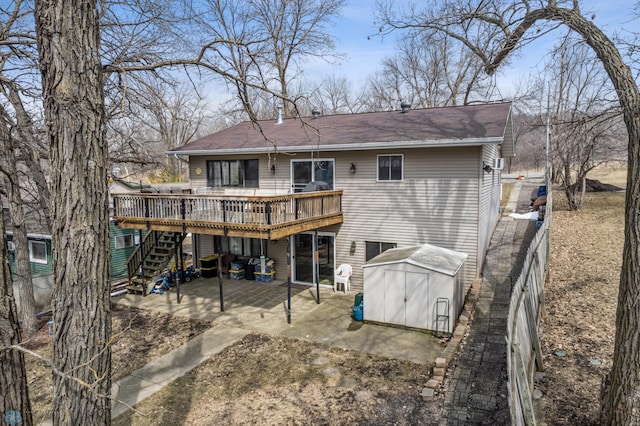 15924 Blackhawk Rd, Lake Park, MN 56554 - back of house with a wooden deck, a patio, stairway, and a shingled roof