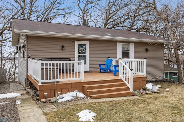 15924 Blackhawk Rd, Lake Park, MN 56554 - back of property with a deck and a lawn