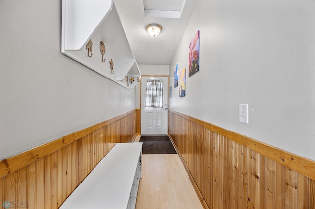 15924 Blackhawk Rd, Lake Park, MN 56554 - entryway featuring wooden walls, wainscoting, and light wood finished floors