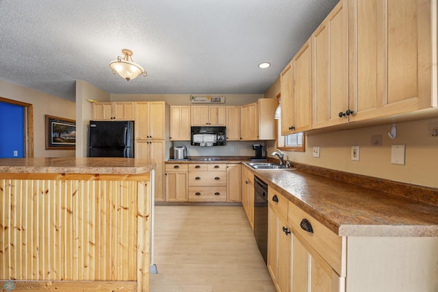 15924 Blackhawk Rd, Lake Park, MN 56554 - kitchen featuring light brown cabinets, black appliances, a sink, light wood finished floors, and a textured ceiling