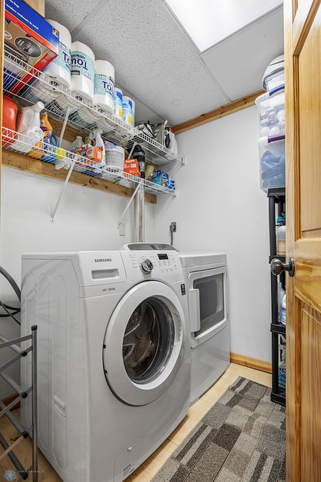 15924 Blackhawk Rd, Lake Park, MN 56554 - laundry room with washing machine and dryer and baseboards