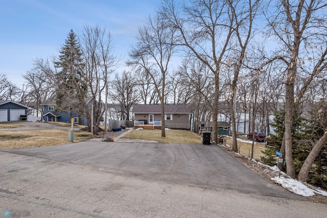 15924 Blackhawk Rd, Lake Park, MN 56554 - single story home with a detached garage, a front yard, and driveway